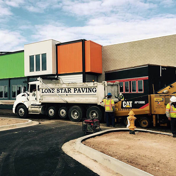 lone star paving truck on job site