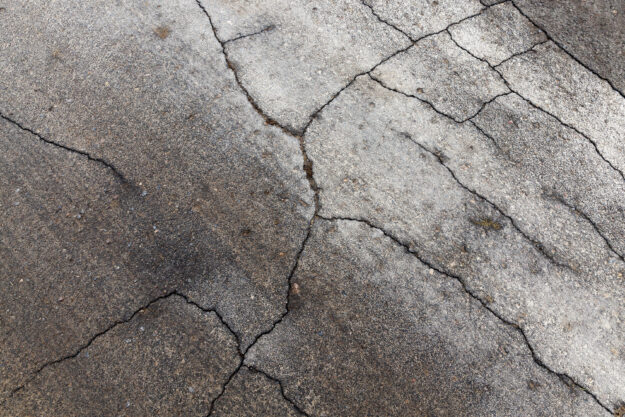 how to repair broken concrete driveway
