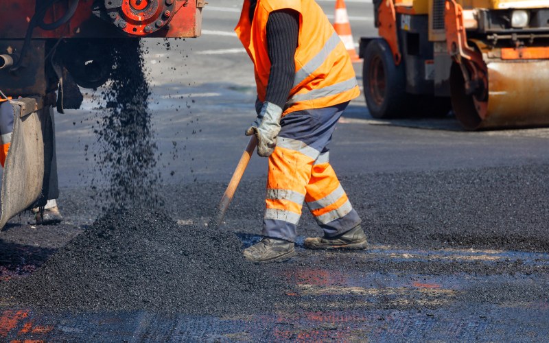 an asphalt paving contractor paving asphalt